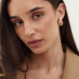 Yves Saint Laurent 1980s Gold Swirl Dome Clip-On Earrings