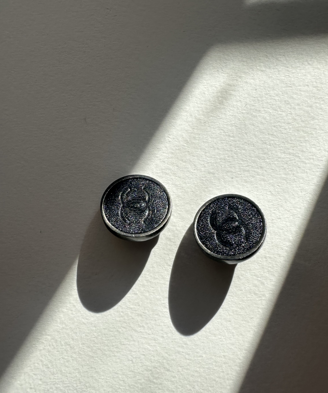 Chanel 2000 Black Leather Silver Tone Clip On Earrings