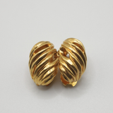 Yves Saint Laurent 1980s Gold Swirl Dome Clip-On Earrings